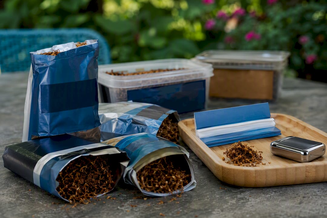 Loose tobacco pouches and rolling accessories